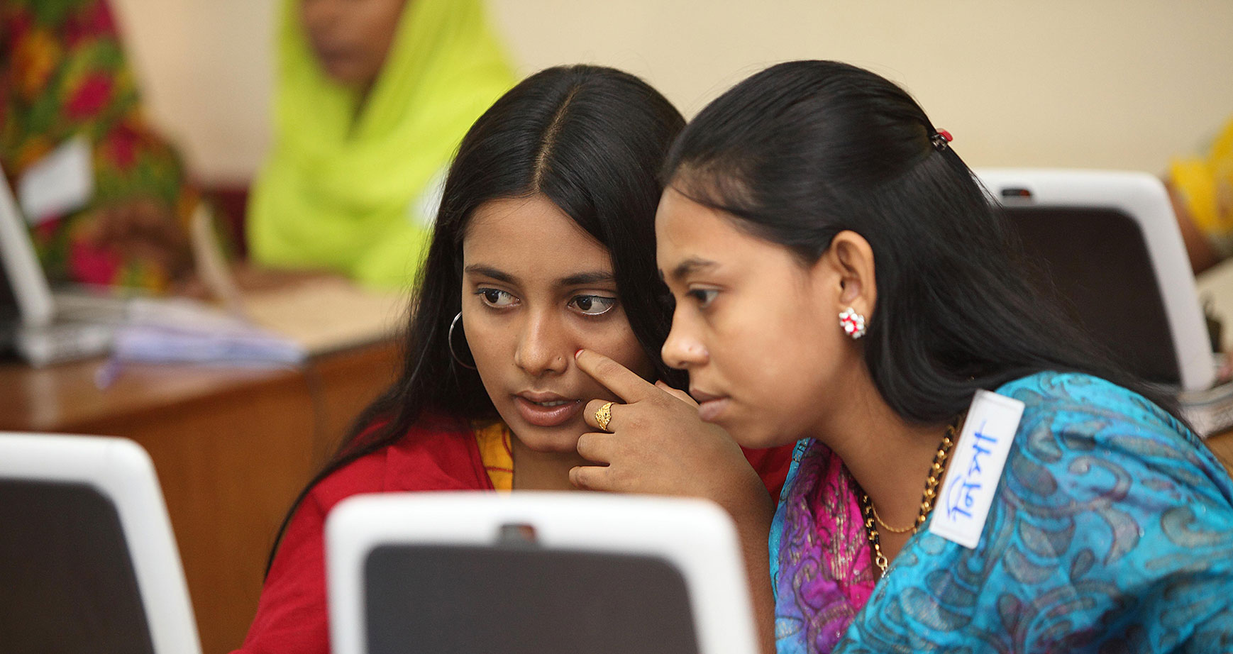 Girls work on computers in a BRAC school in Bangladesh