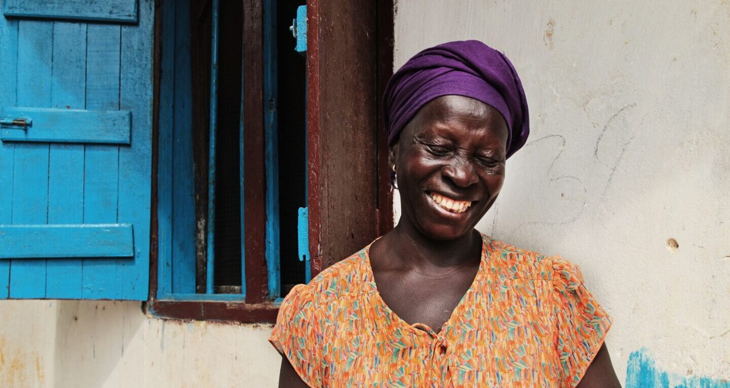 A farmer in Liberia smiles