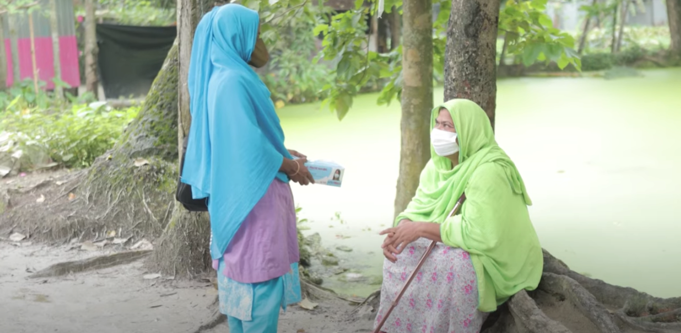 Hazera distributes masks in remote villages across Bangladesh.