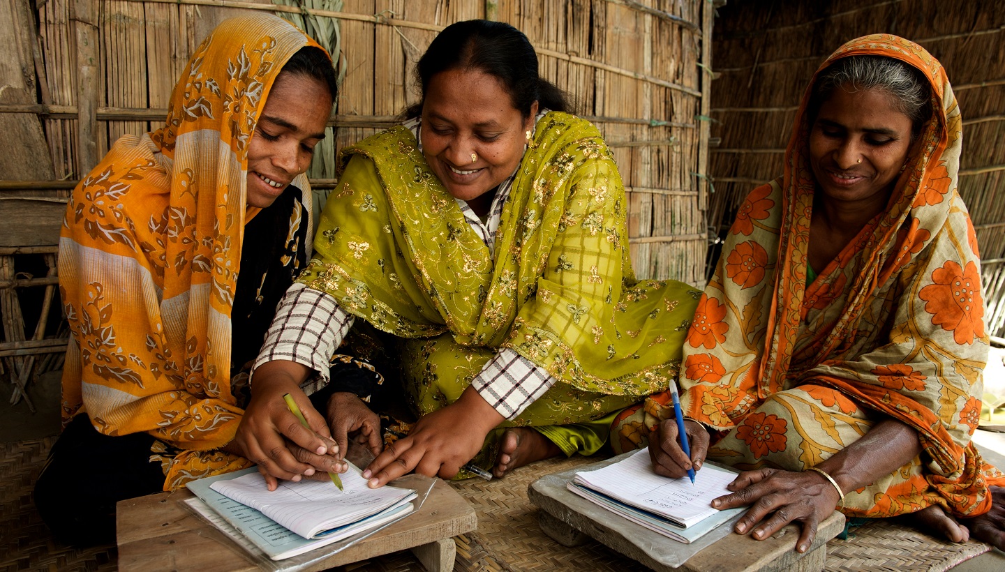 Women learning how to write