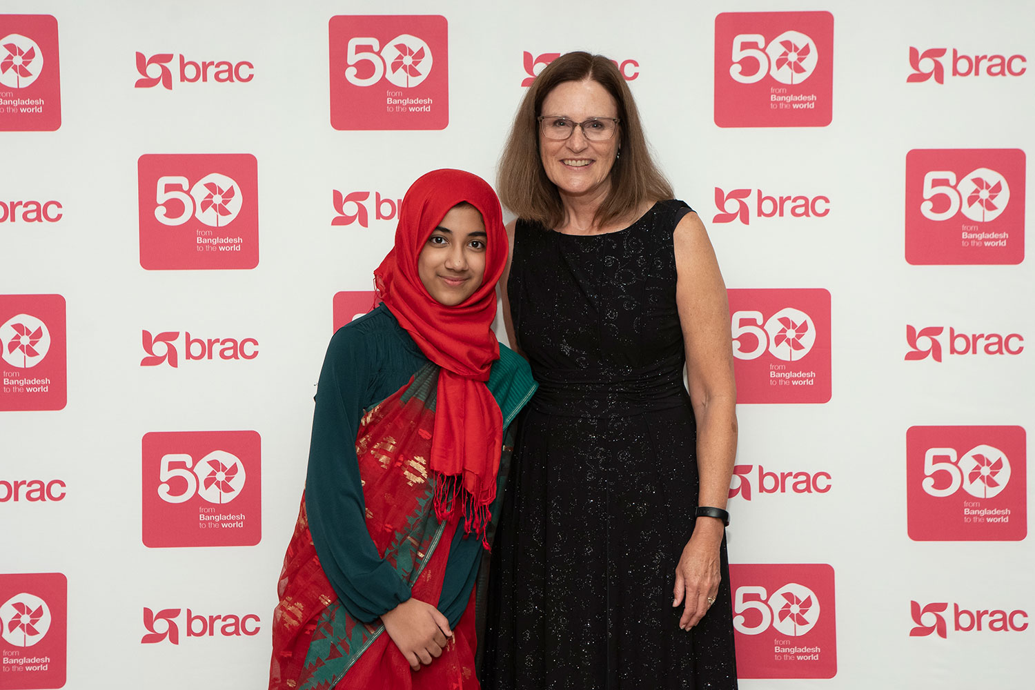 Faatiha poses with Donella Rapier, President and CEO of BRAC USA, at BRAC’s 50th anniversary celebration in New York City in September 2022. Photo by Ayano Hisa.