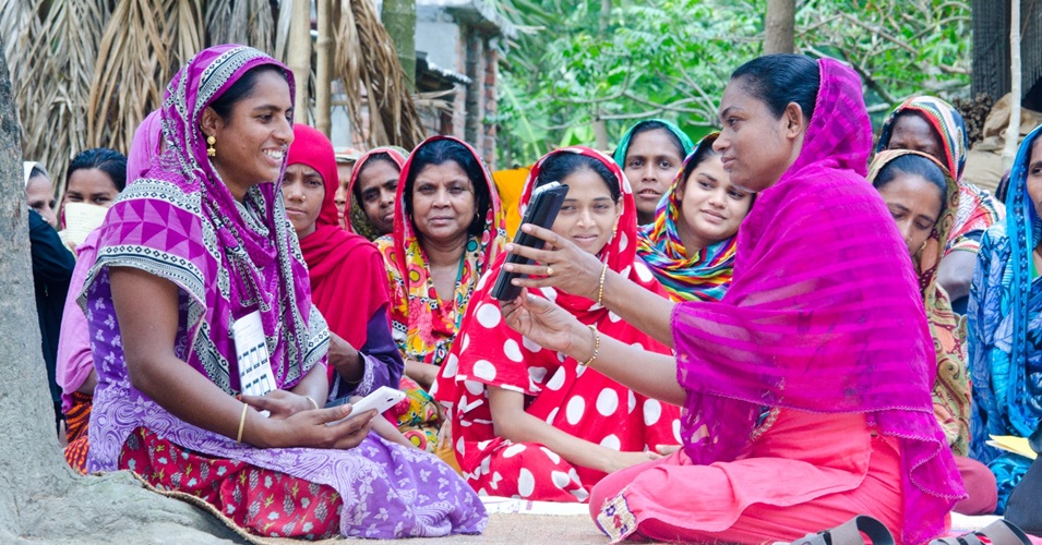 A group of women participating in a microfinance group in Bangladesh.