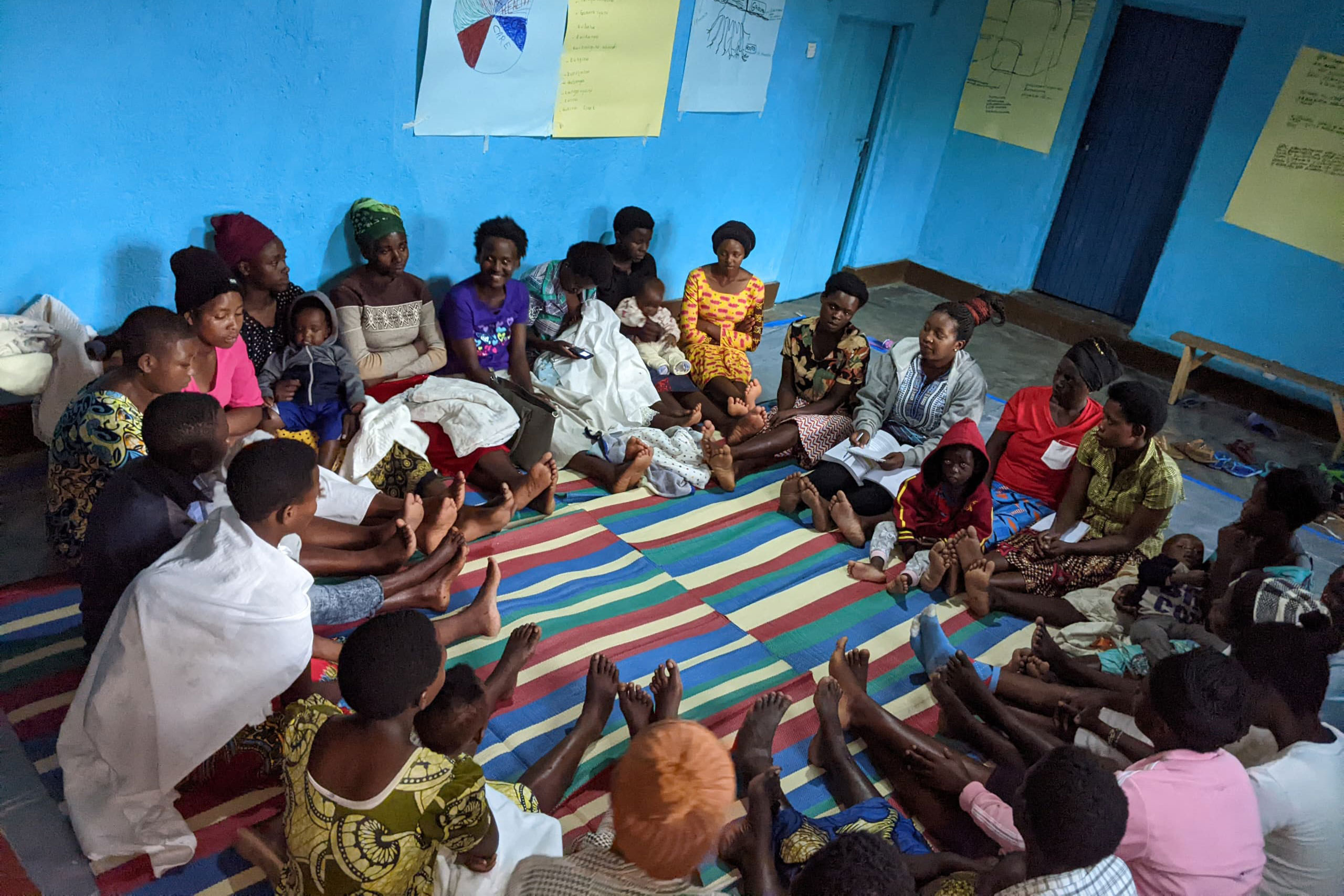Image of a several girls sitting in a circle at a BRAC girls empowerment club in Rwanda