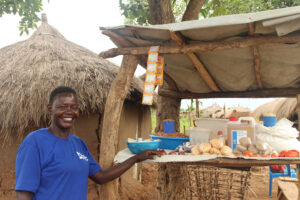 Annet poses with her shop stall