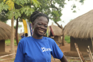 Edina, a South Sudanese refugee living in Uganda, laughs