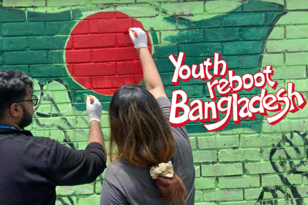 Two young adults, one male on the left, one female on the right, stand with their backs to the camera while stretching toward a wall they are painting. the wall is green, with a red circle to represent the flag of Bangladesh. Text on the right reads "Youth reboot Bangladesh"