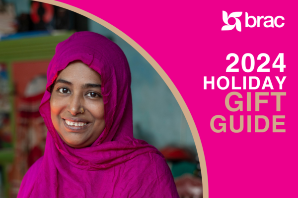 A magenta designed graphic that reads "BRAC 2024 HOLIDAY GIFT GUIDE" alongside a portrait of a woman in BRAC's Ultra-Poor Graduation program in Bangladesh.