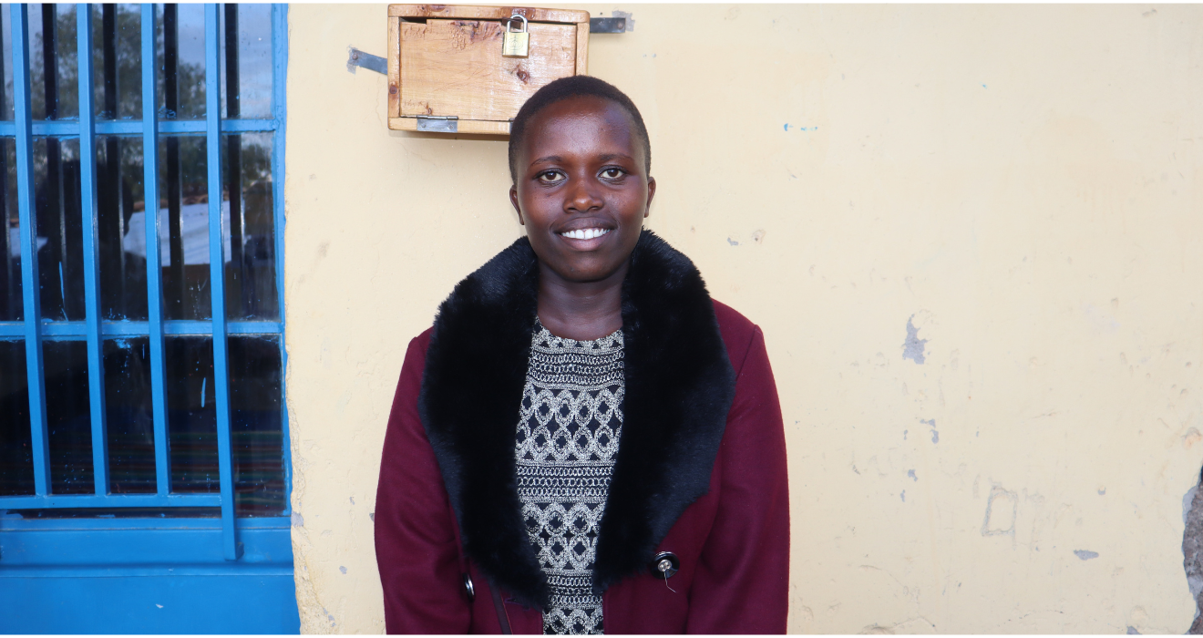 A portrait of Liliane smiling